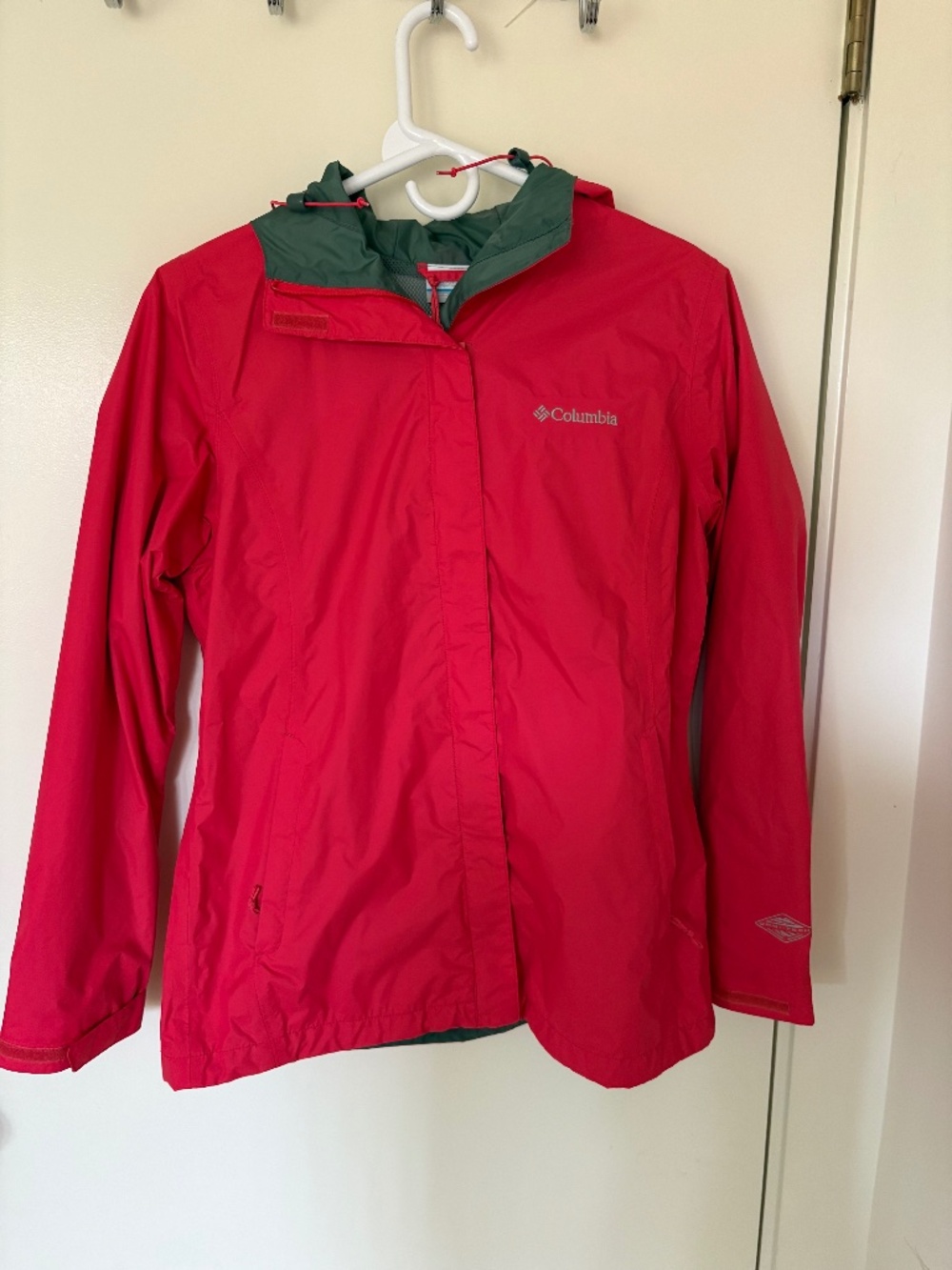 Bright pink columbia rain jacket